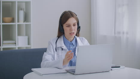 consultation-of-doctor-by-telephone-female-physician-is-answering-on-questions-of-patients-in-call-center-profile-view